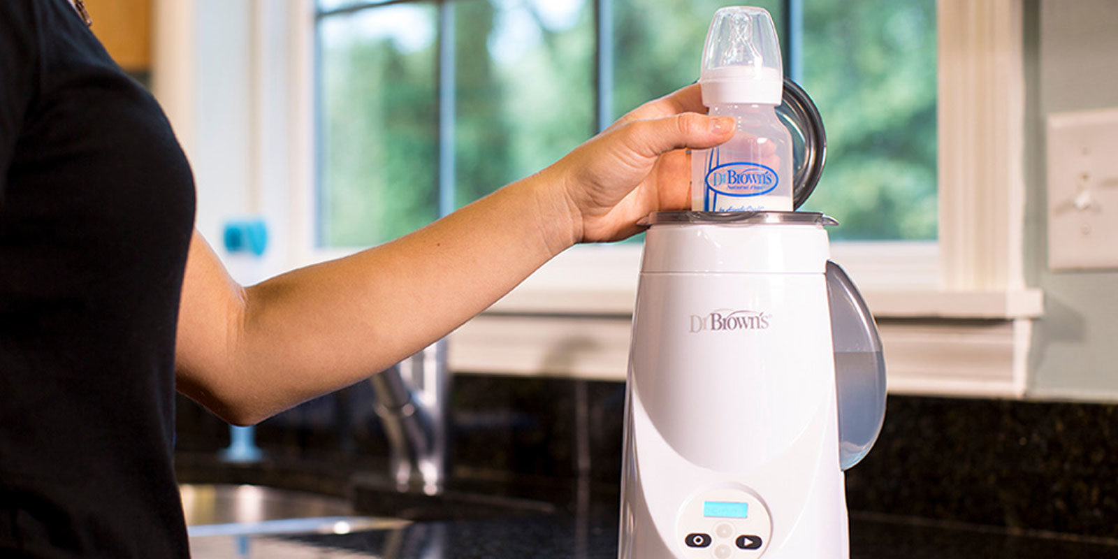 Warm breastmilk on the go! A large-mouth Thermos with warm water