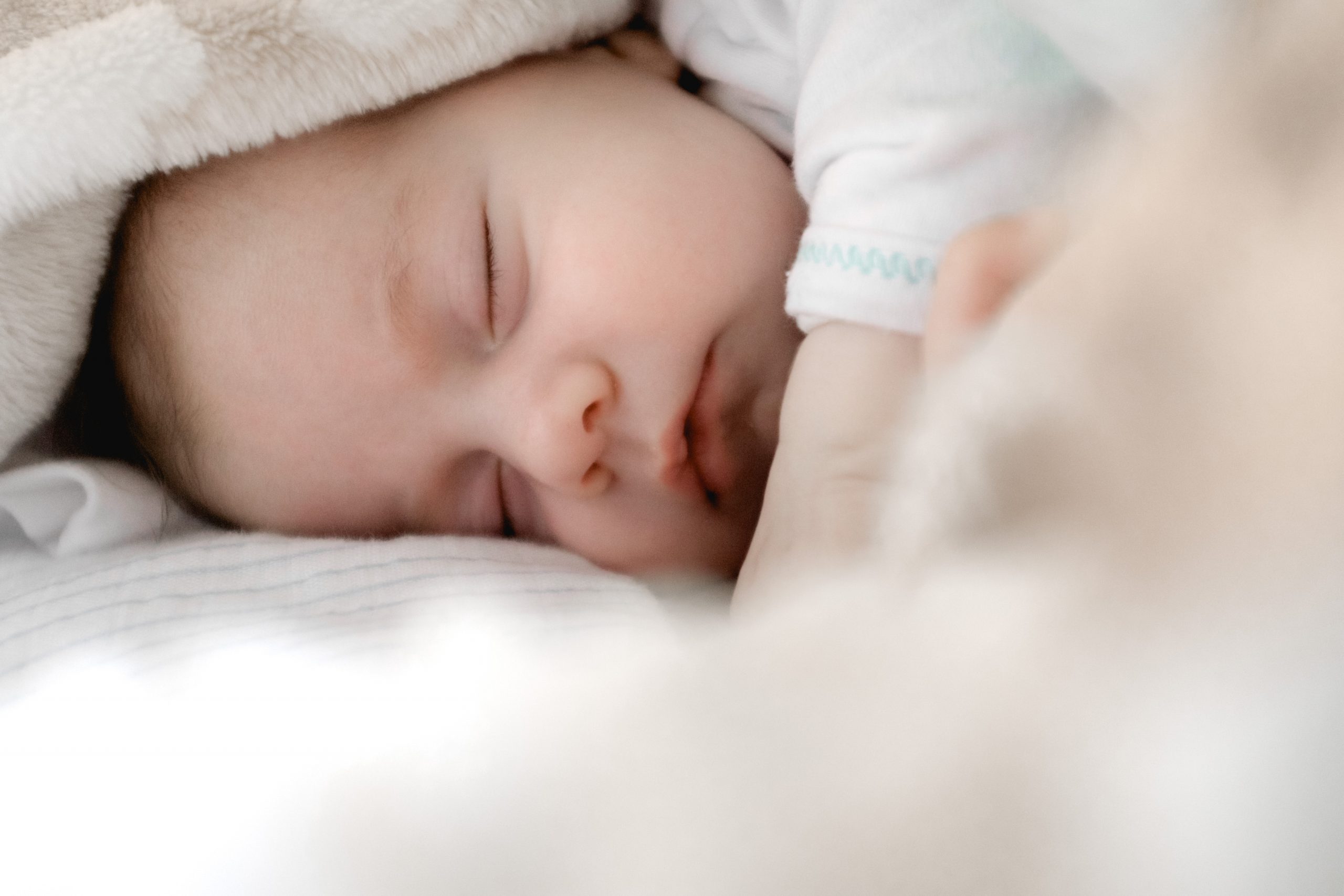 selective focus photography of sleeping baby scaled