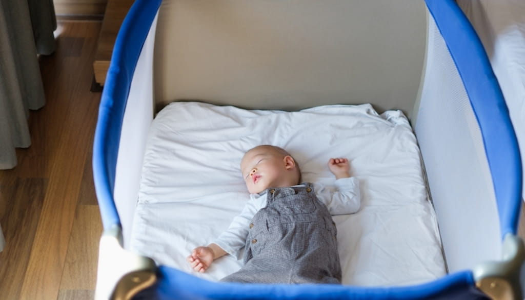 How Long Can a Baby Sleep in a Pack and Play: Guidelines and Safety Tips